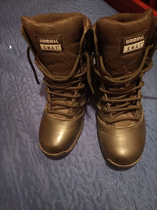 Botas táticas como novas