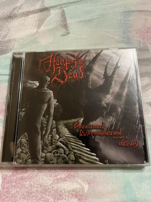 Cd Heaps of Dead-Deceased  Dismembered And Left To  Decay.