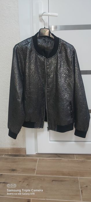 Продам курточку нову розмір XL чорного кольору жіноча