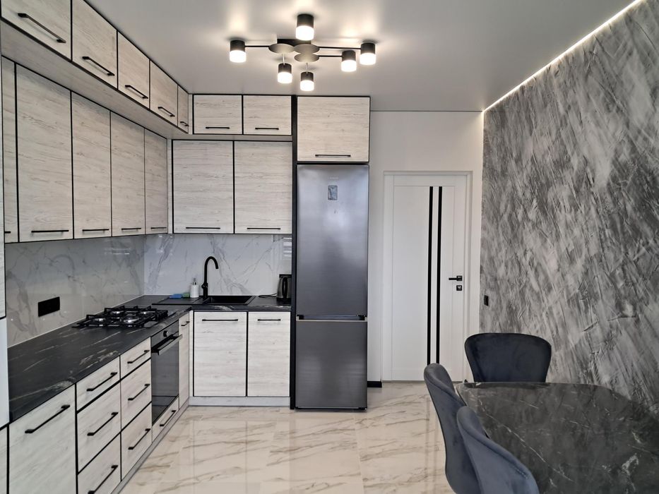 Е-Оселя, 1-к, Б. Хмельницького,57