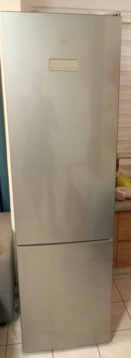 Drzwi, panel, półki, Beko MCNA406E33ZXB

Drzwi chłodziarki do lodówki