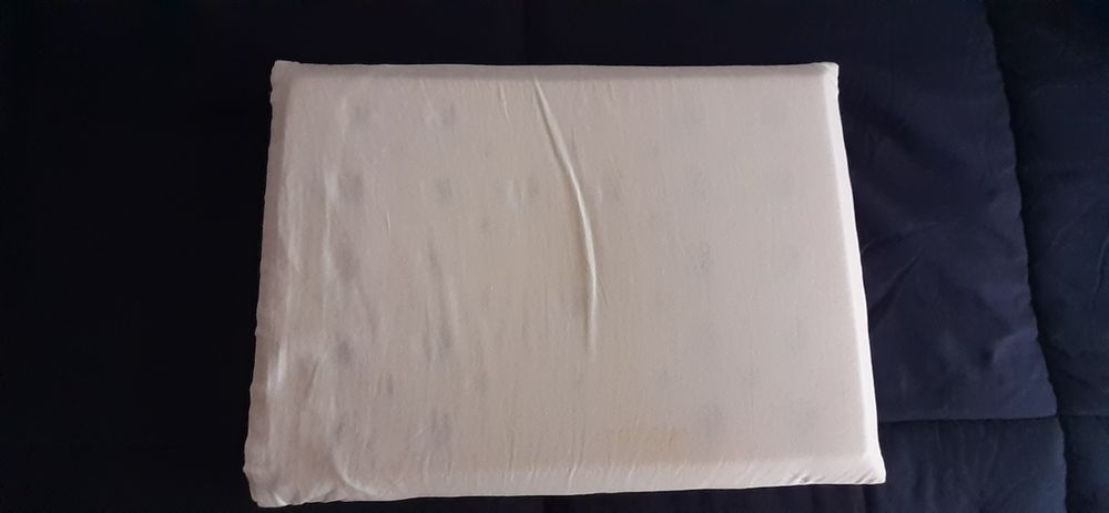 Almofada ergonómica de bébé.