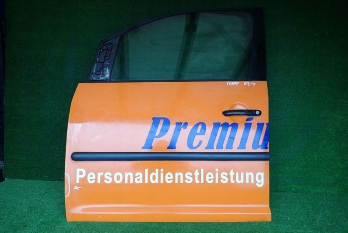 VW CADDY 03- drzwi lewe przednie przód
