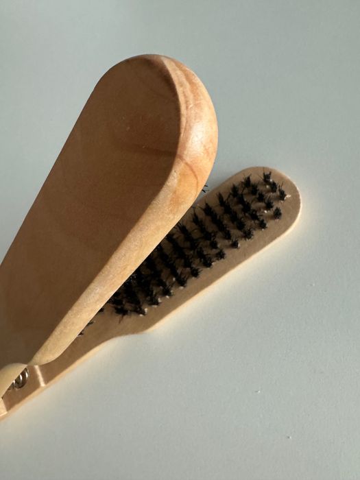 Escova de alisar o cabelo