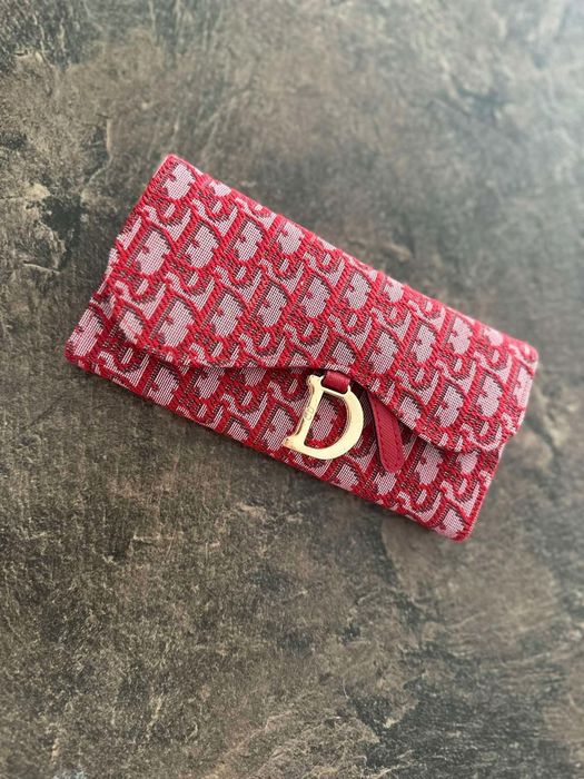 Portfelem portfel Cristian Dior