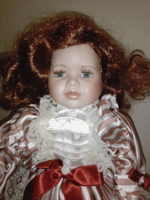Bonecas de porcelana estão novas  como se vê nas fotos