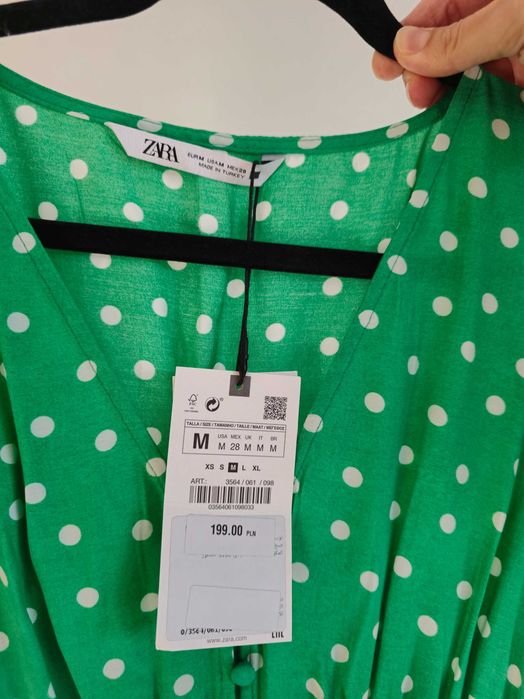 Zielona sukienka midi w grozki / kropki