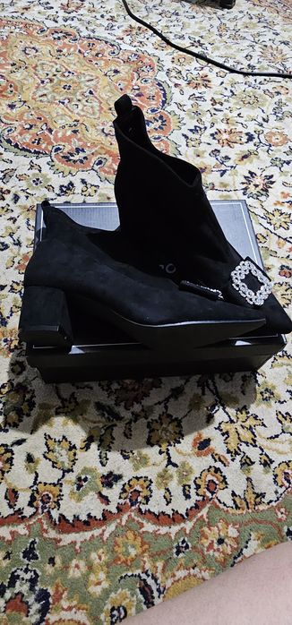 Botas em camurça pretas