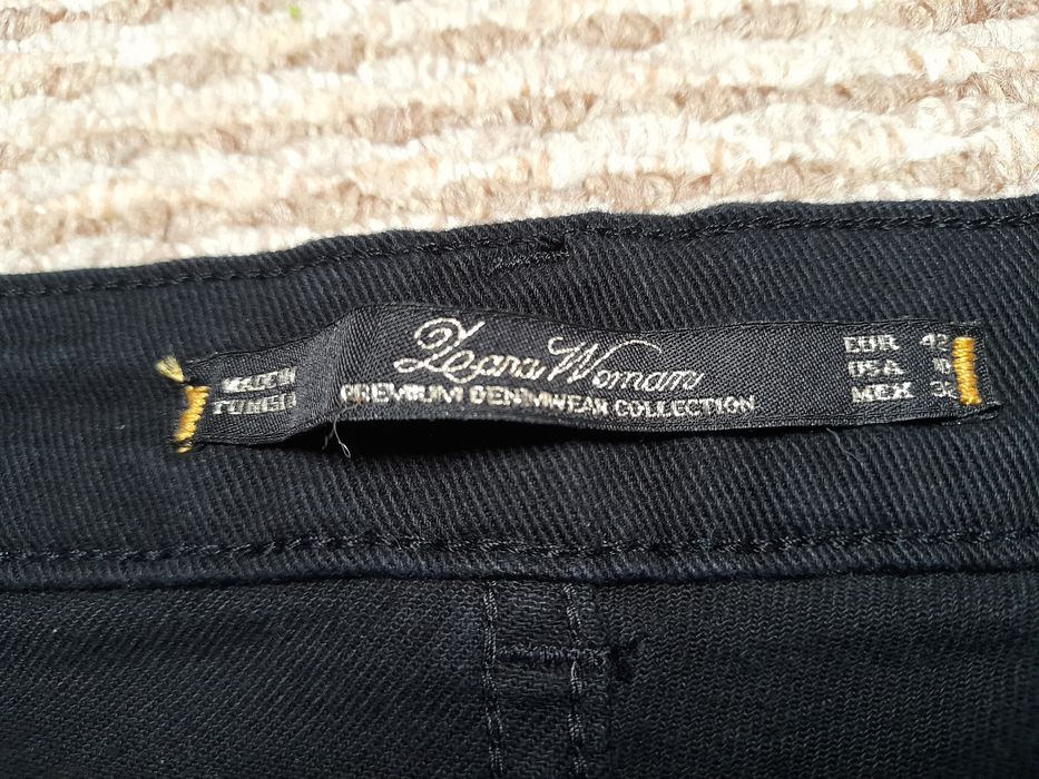 Spodnie jeansy Zara r. 42 długość 84cm