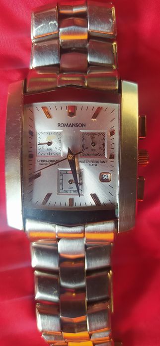 Часы Romanson.    .