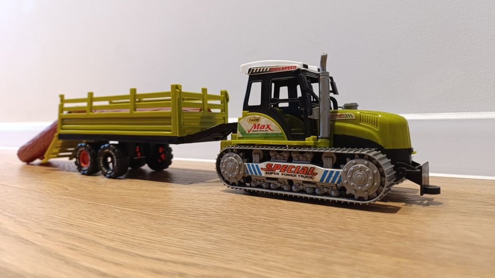 Трактор з причіпом інерційний