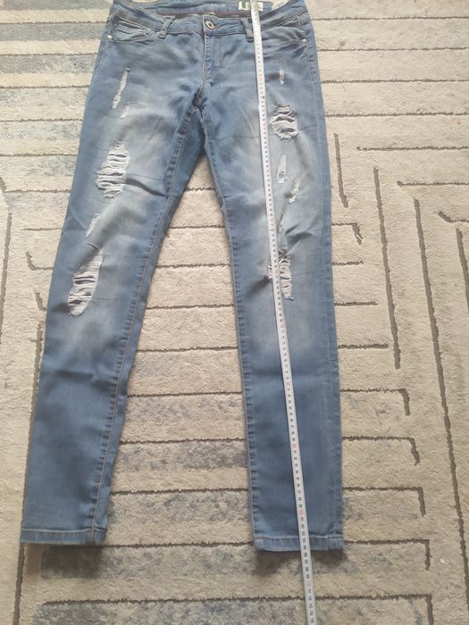Spodnie skinny jeans z dziurami roz 31/L32