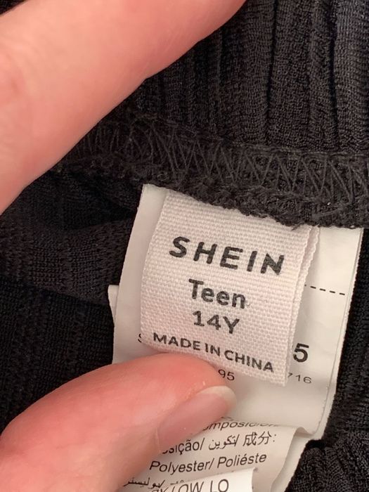Штани кльош чорні Shein