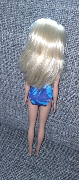 Barbie e boneco Simba