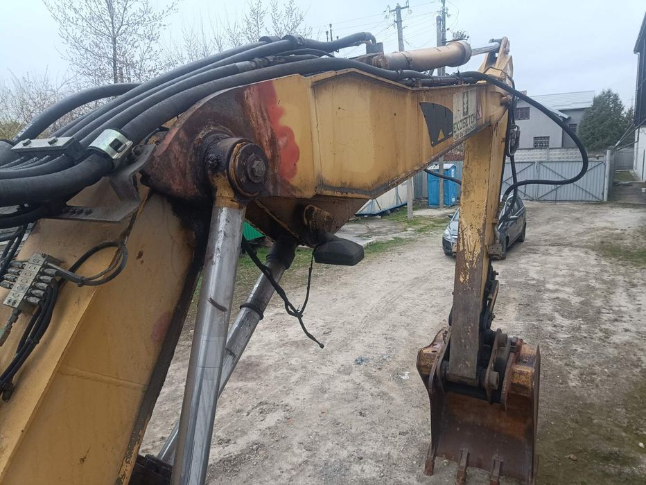 Екскаватор Caterpillar M312
