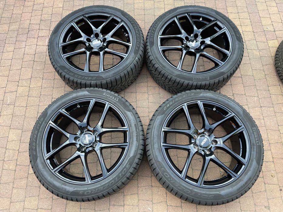 3834. Koła wielosezonowe Tesla S czarne 5x120 245/45/19 nowe opony Bridgestone 2025r