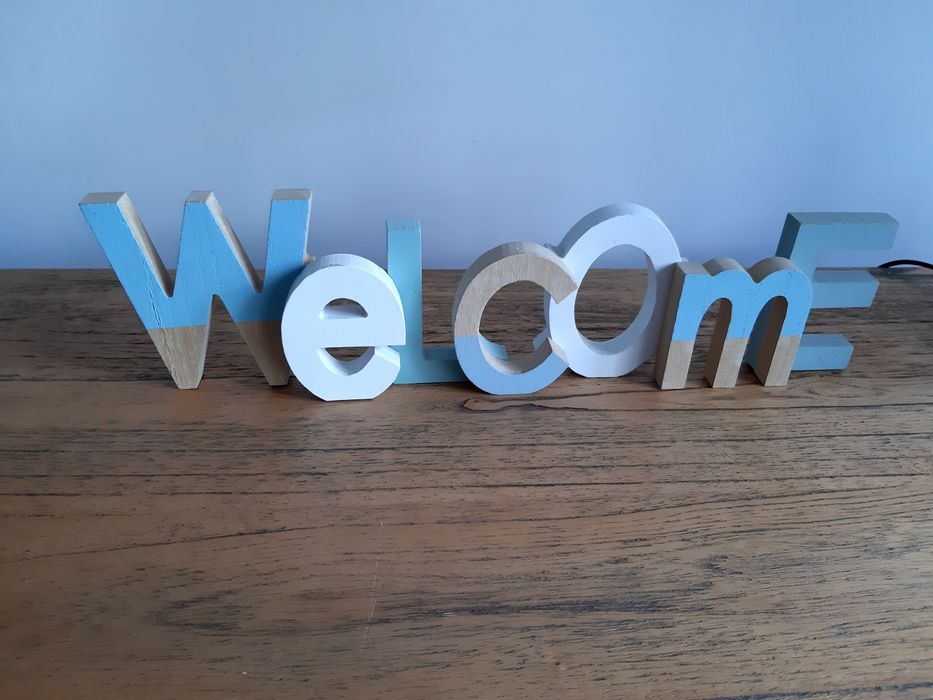 Placa em madeira 'welcome'