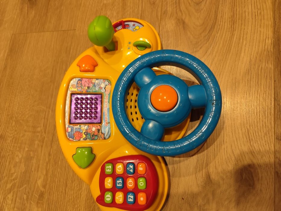 Pchacz, jeździk, bujak Fischer Price świetny na prezent