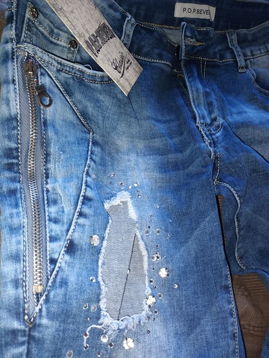Nowe spodnie-rozciągliwy jeans