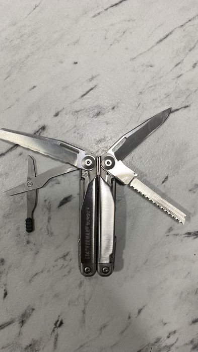 Мультитул Лезерман Сурдж