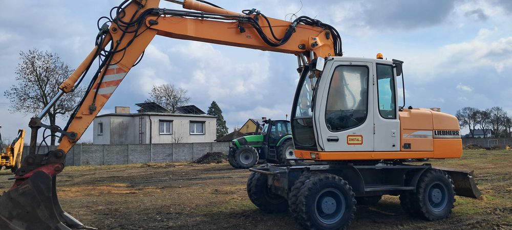 Koparka kołowa Liebherr 316.
