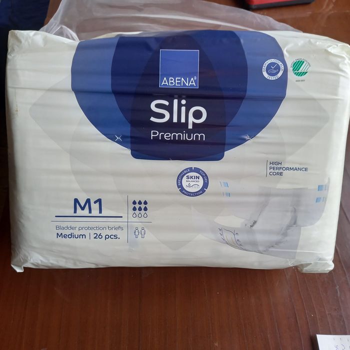 Подгузники и пеленки для взрослых