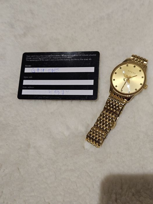 Relógio Gucci dourado