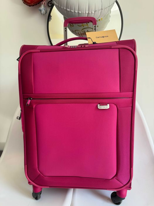 Duża różowa walizka Samsonite