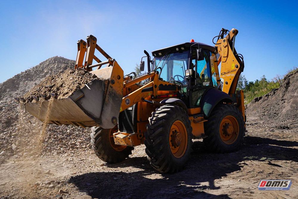KOPARKA koparko-ładowarka zimia kruszywo Prace ziemne