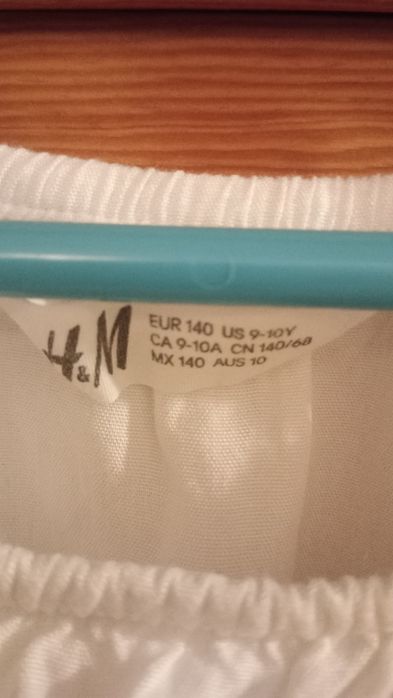 Biała bluzeczka 140