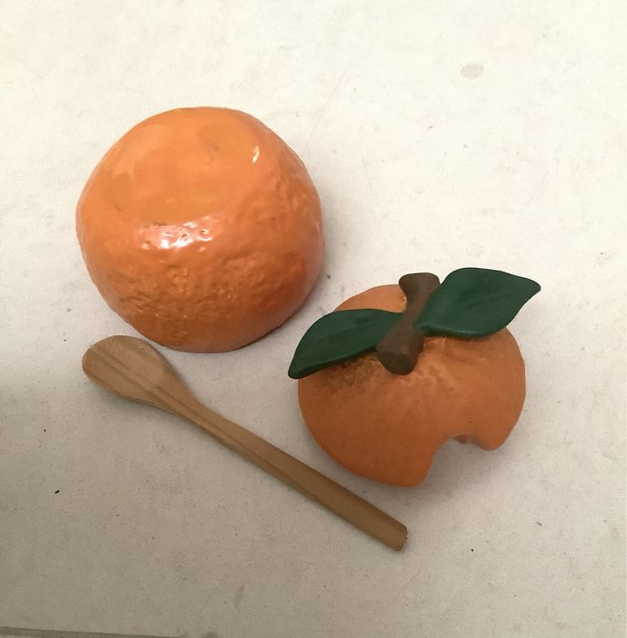 Orange-shaped ceramic container468574123674183684