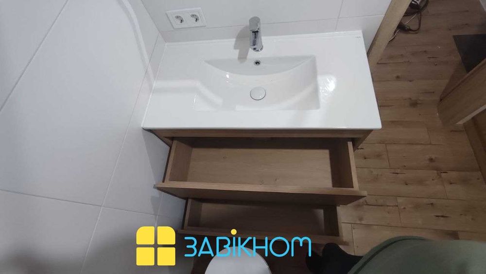 Стільниці з каменю суцільно вилиті з умивальником