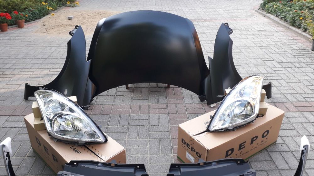 SUZUKI SWIFT MK7 2010 - maska pokrywa silnika