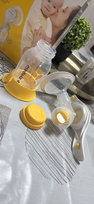 Vendo máquina manual de tirar leite e sacos de congelar o leite