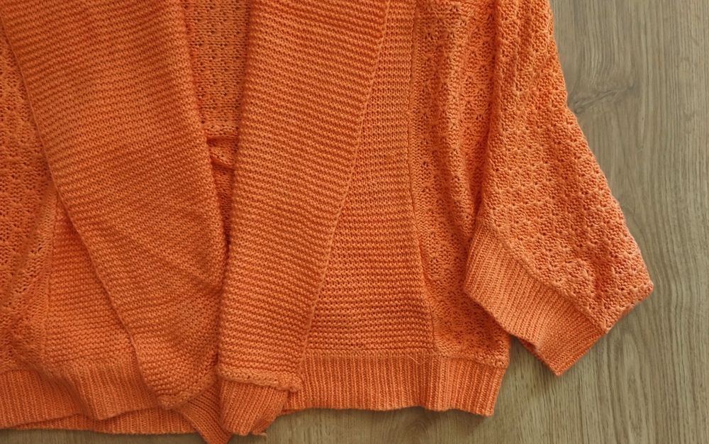 Pomarańczowy sweterek bolerko TAKKO