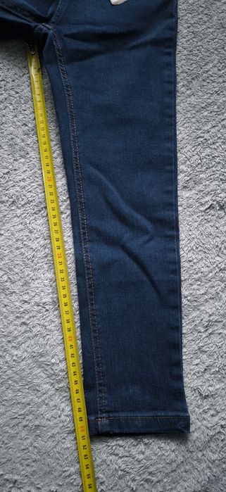 Nowe spodnie jeansowe coccodrillo r. 122