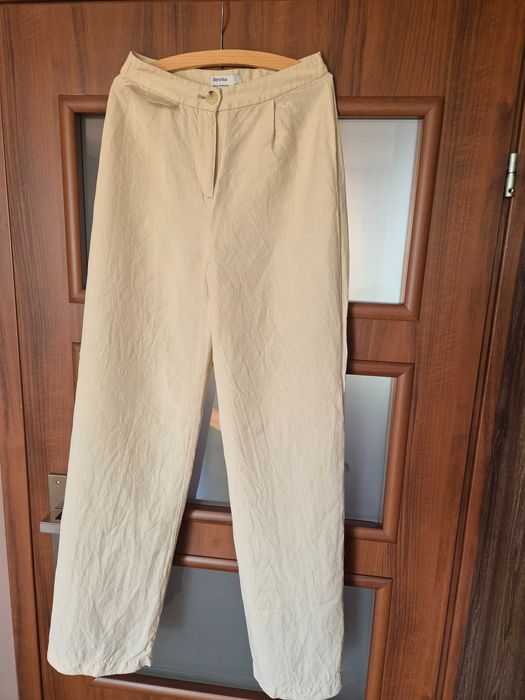 Lniane spodnie z szeroką nogawką Bershka.36