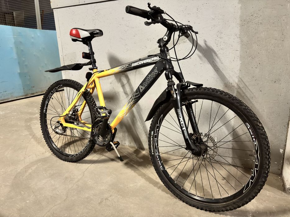 велосипед discovery pro active