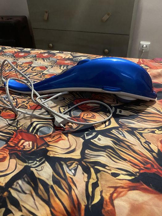 Massajador em forma de golfinho