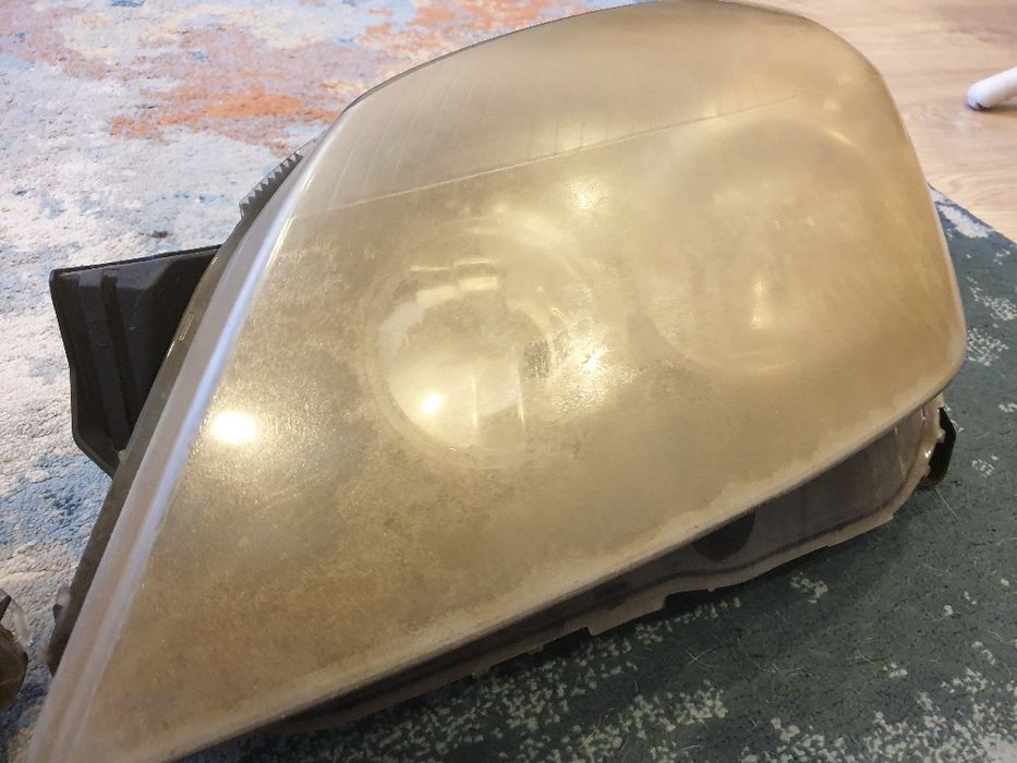 Faróis originais Opel Astra H