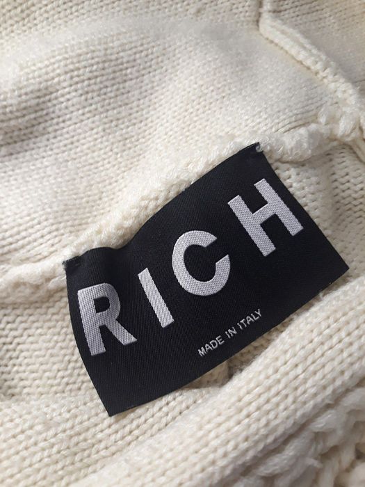 Светр з бахромою