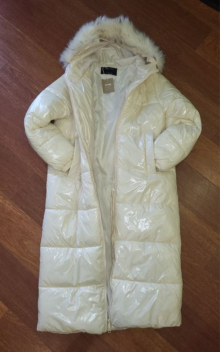 Продам новый  пуховик