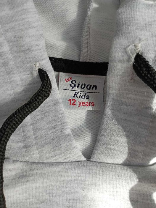 Bluza unisex z kapturem sciaganym jasno szara 12 lat 152