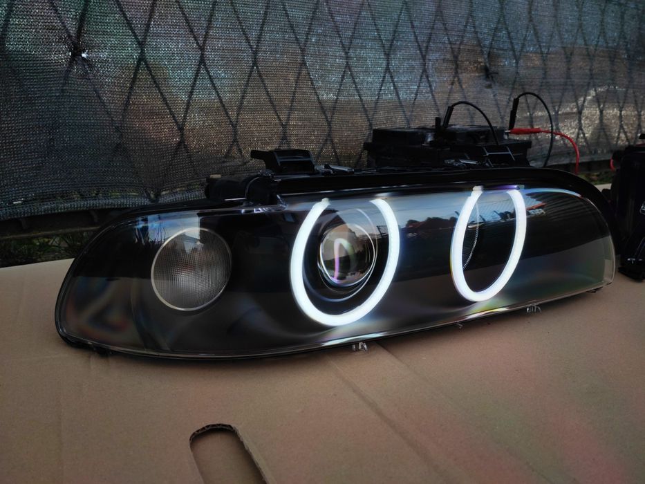 BMW E39 Lampy BiLED BLACK NOWE Hella Regeneracja Ringi Mocne światło!