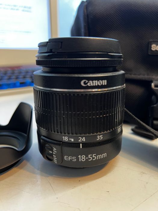 Canon 600D com lente, bateria extra e bolsa