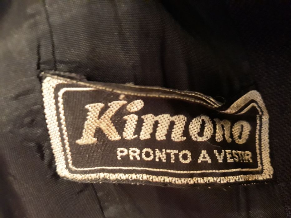 Conjunto saia e casaco preto tamanho 40 como novo