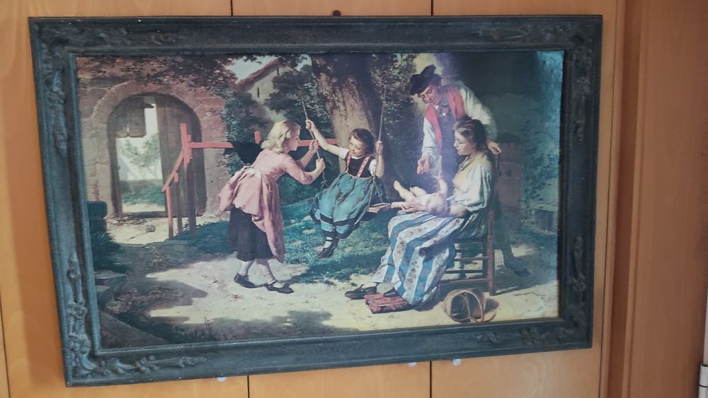 Quadro antigo com imagem de família