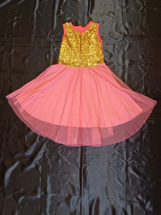 Святкова сукня на дівчинку в золотих паєтках