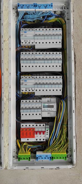 Elektryk Podłączenie płyty indukcyjnej  Pomiary Przeglądy Instalacje