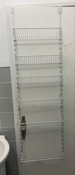 Suporte arrumacão porta